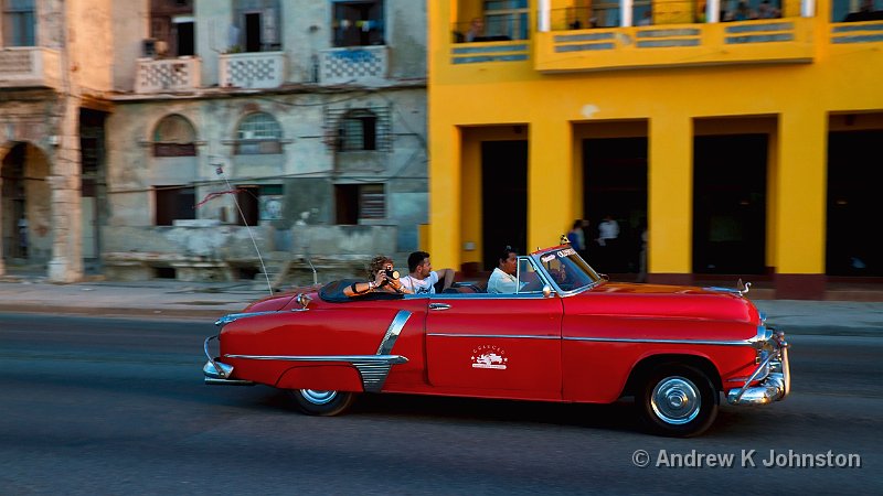 1110_7D_2611.jpg - Red car at sunset on the Malecon, Hanana