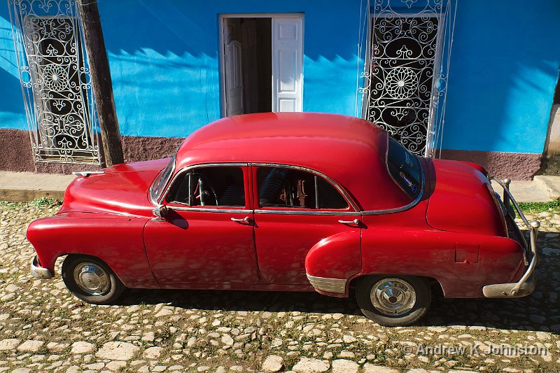 1110_7D_3945.jpg - Red car and blue building, Trinidad