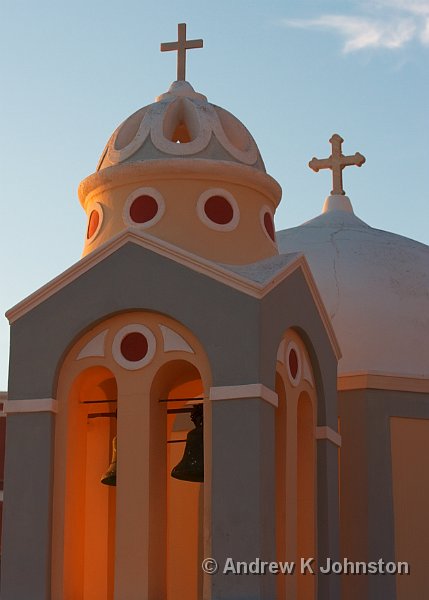 0909_40D_9253.JPG - Church dome lit from within by sunset light in Fira, Santorini